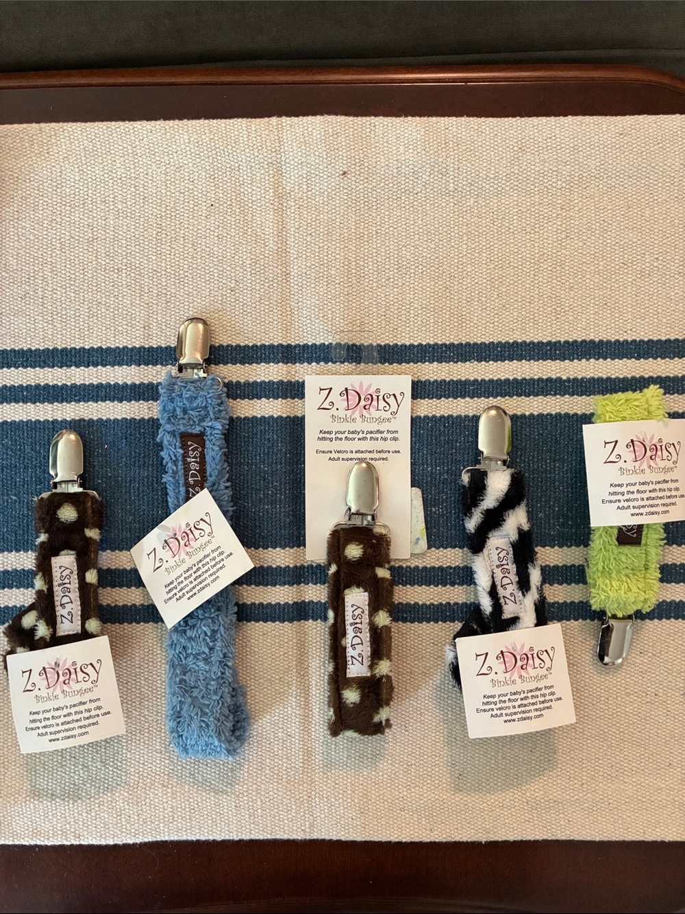 Daisy Plush Pacifier Clips - Blue, Brown, Black & Green